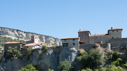 Fototapeta na wymiar View from below of the beautiful village of Puentedey, Merindades, Burgos, Spain, Europe