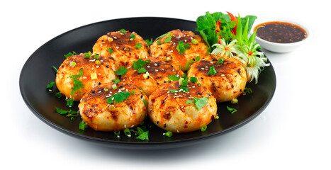 Fried Pan Steamed Bun or Sheng Jian Bao with Spicy Red Chili Oil Sauce filled with Mince Pork