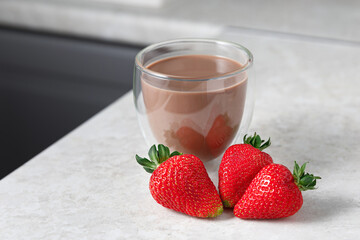 cocoa with strawberries on the kitchen table