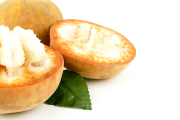 Fresh Santol fruit, meliaceae fruit, cottonfruit (Sandoricum koetjape) isolated on white background. tropical fruit grown in Southeast Asia