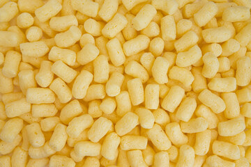 yellow sweet corn sticks background, view from top