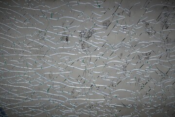 Broken glass texture in numerous cracks 