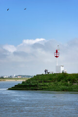 Fototapeta na wymiar Silhouette of photograph in Saint-Valery-sur-Somme coast. Bay of the Somme 