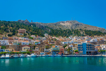 Fototapeta na wymiar Kalymnos harbour view from sea. Kalymnos Island is a popular tourist destination in Greece.