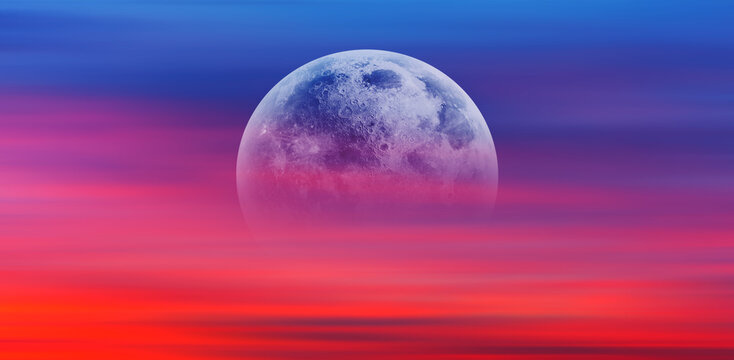 Night sky with moon in the  clouds at amazing sunset "Elements of this image furnished by NASA