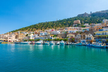 Fototapeta na wymiar Kalymnos harbour view from sea. Kalymnos Island is a popular tourist destination in Greece.