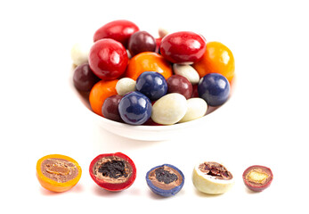 A Mix of Candy Coated Chocolate Covered Dried Fruit Isolated on a White Background