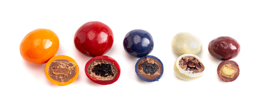 A Mix of Candy Coated Chocolate Covered Dried Fruit Isolated on a White Background