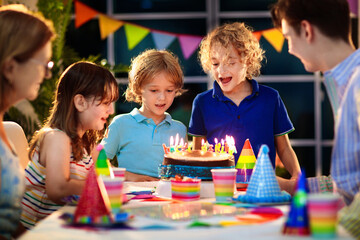 Fototapeta na wymiar Child birthday party cake. Family with kids.