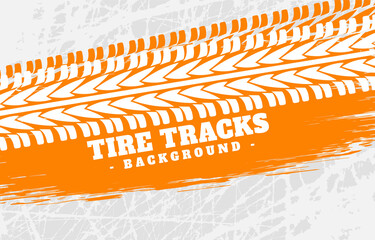Orange tire tracks imprint background 