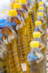 blurted background with oil bottles