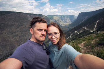 Couple selfie on the top of Altai mountain