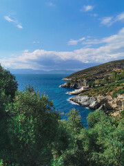 Fototapeta na wymiar Panoramic views of the picturesque landscape with cliffs, blue Aegean sea and greenery. Turkey, Kusadasi. Europe.