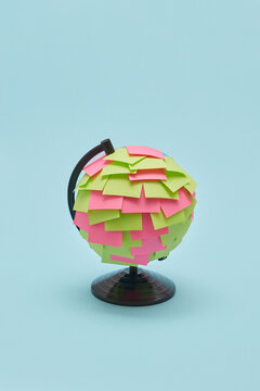 Earth globe with paper stickers