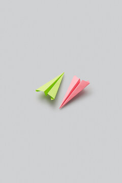Green and pink paperplanes
