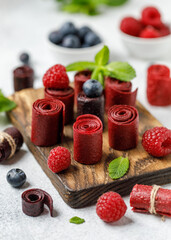 Fruit marshmallow. Berry pastille on white background. Pastille fruit rolls  