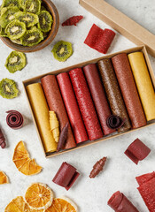 Fruit marshmallow. Berry pastille on light background. Pastille and fruit chips, frips