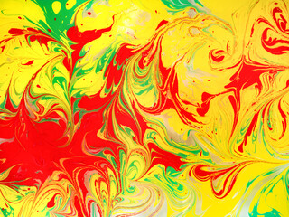 Drawing in the ebru technique without a sketch, painting on water, abstract drawing, beautiful pattern..Abstract marbling colorful background.