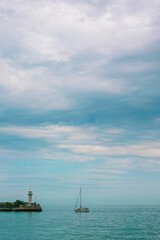 minimalistic seascape. lighthouse on the sea