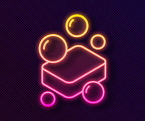 Glowing neon line Bar of soap icon isolated on black background. Soap bar with bubbles. Vector