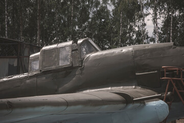 Rusty cockpit of an old abandoned plane. Abandoned military aircraft.