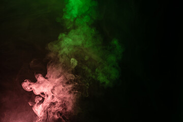 Green and pink steam on a black background.