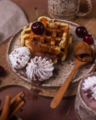 Hot chocolate and brownies on a beige background