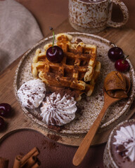 Hot chocolate and brownies on a beige background