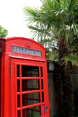 A Red Telephone Box within the Gardens