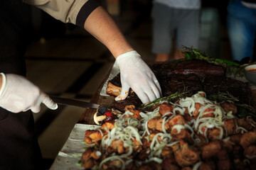 Final cooking of the hot meat by the chef