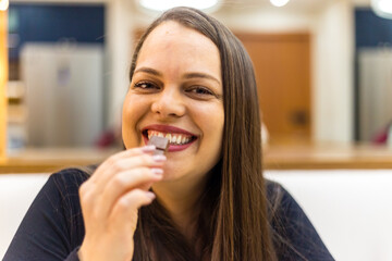 woman eating chocolate