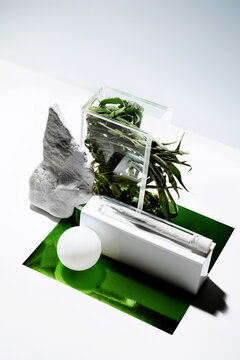 Artistic still life cannabis set with joint and marijuana leaf 