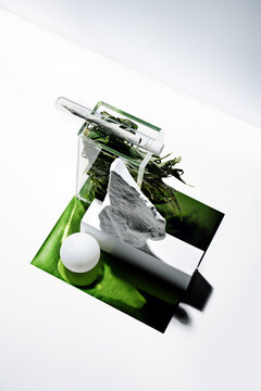 Artistic still life cannabis set with joint and marijuana leaf 