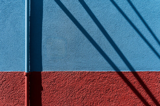 Water pipes on a colored wall