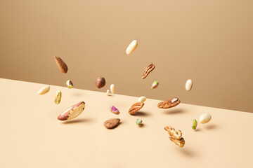 Bunch of assorted nuts falling down