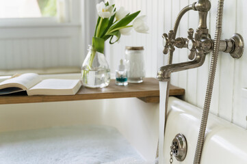 Faucet Filling Tub with Water for Relaxing Spa Bath