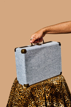 man with a retro briefcase
