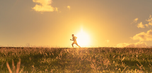 Man running jogging in a grass field. Health and fitness concept. 