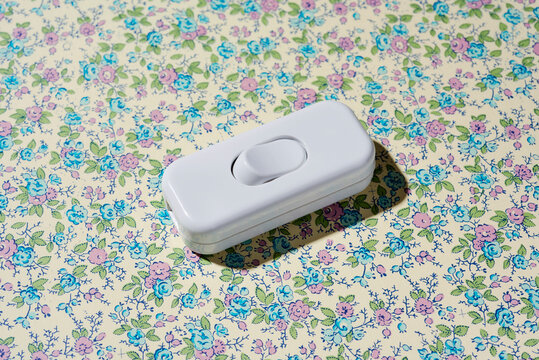 cord switch on a floral background