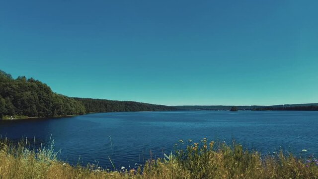 river svir river flow view from the bank to the entrance of the hydroelectric power station and the coast guard boat