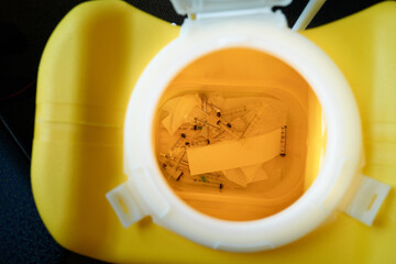 Used needle container