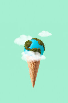 Earth globe with green moss in ice cream cone