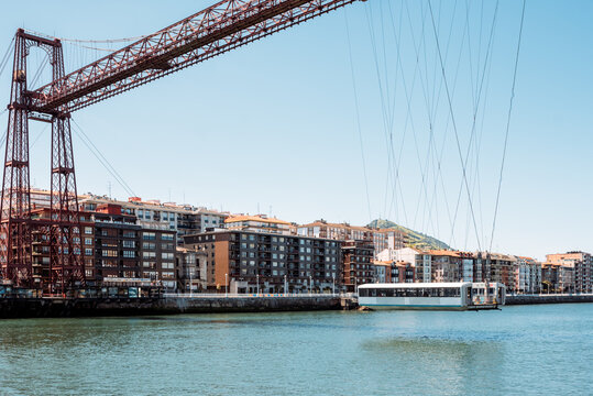 Contemporary transporter bridge over city river