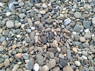Sea pebbles close-up. Background image.