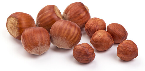 Natural Organic hazelnuts, isolated on white background.