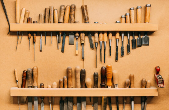 Carpenter tools hanged on wall