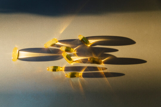 Light refracted through Cod Oil Capsules 