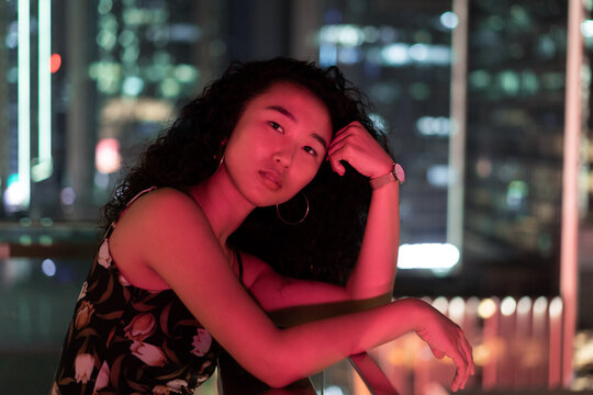 Young Girl in the night cityscape