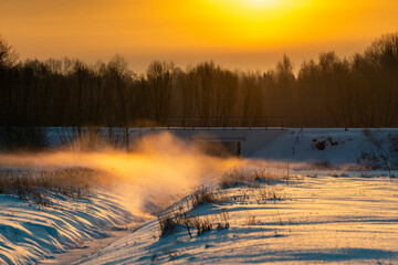 Snow-coverd, frozen fields and meadows, eastern Poland, beautiful sunrise, Podlasie