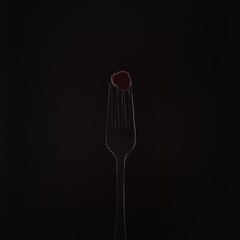 raspberry on a fork